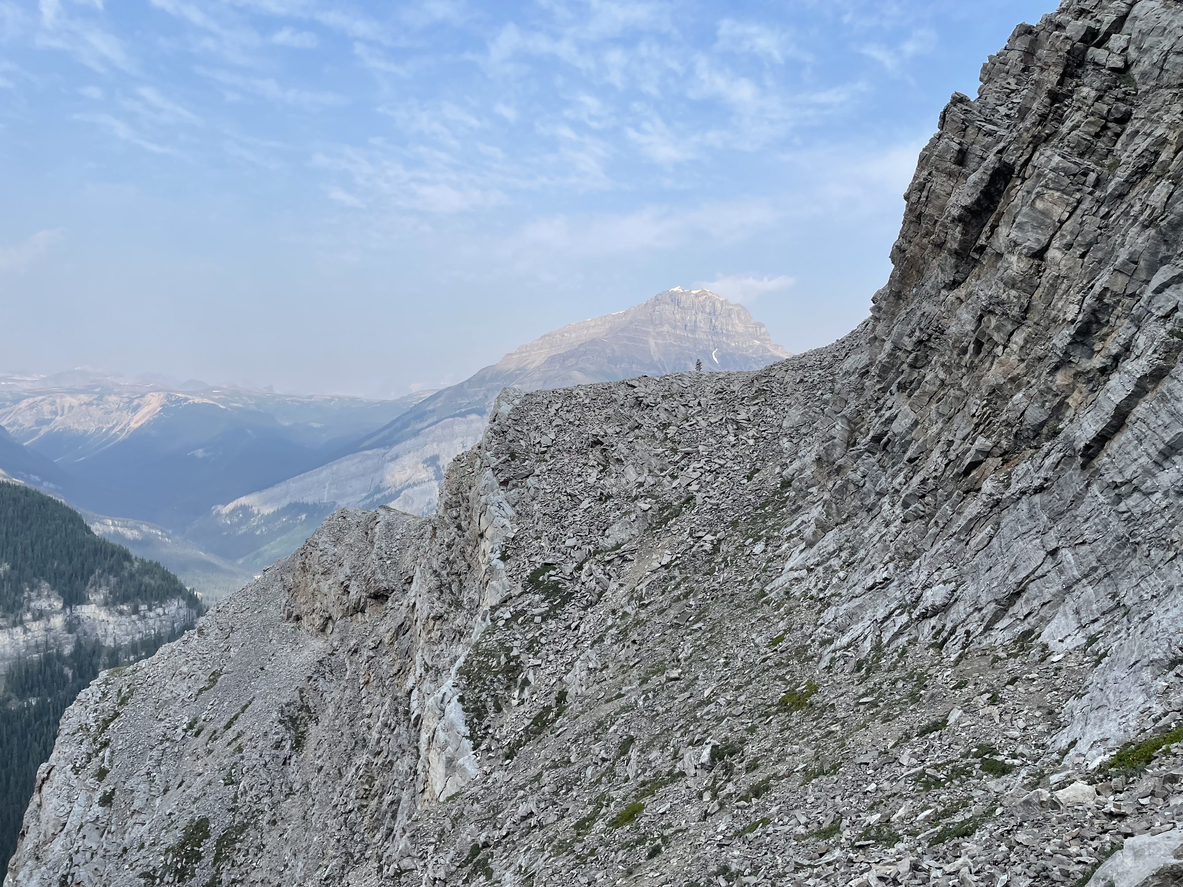 Looking back at our perfect choice of ledge on Brewster Peak