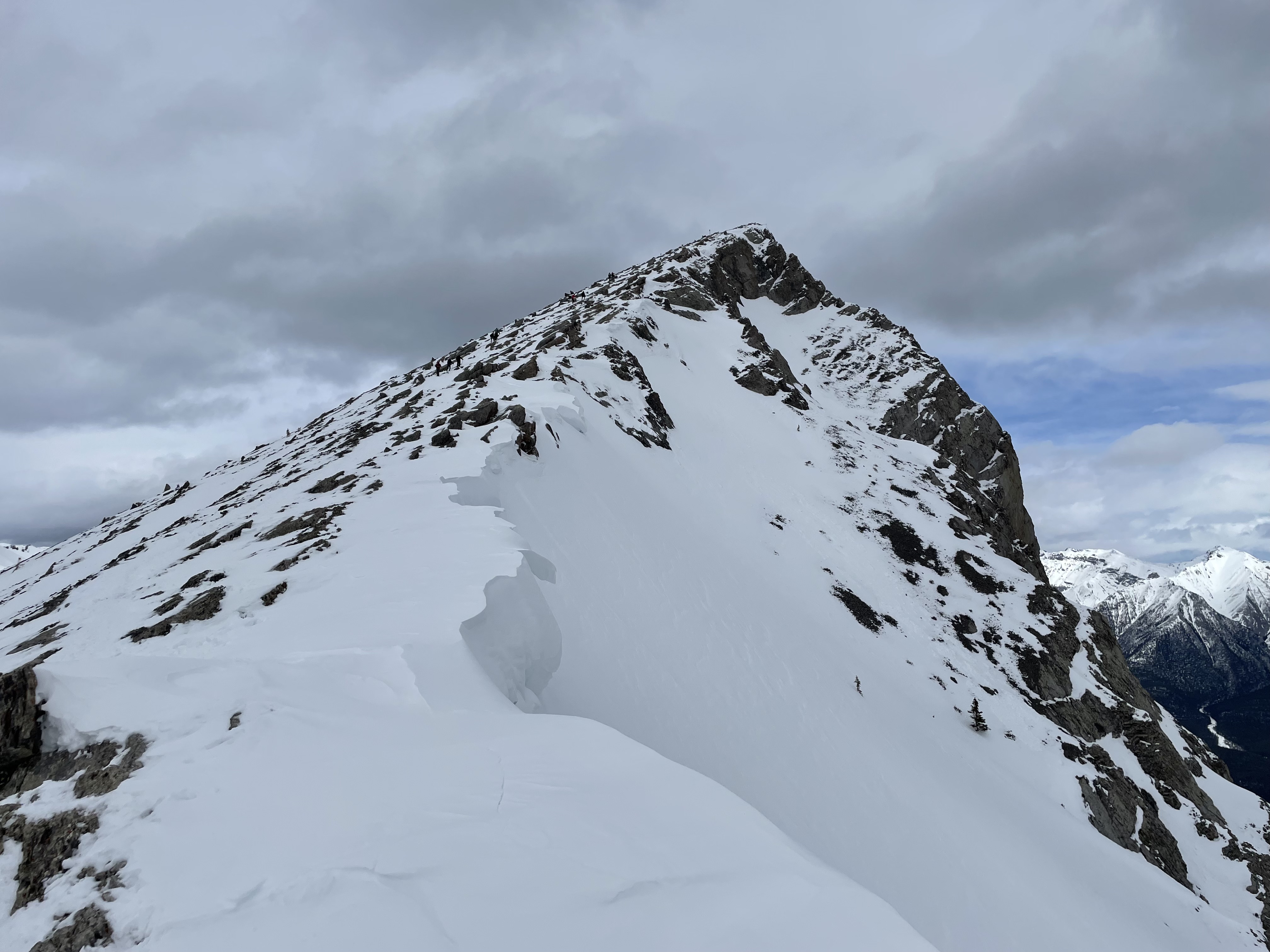 We’d be going up Ha Ling only on this day. Also, I don’t know why people do it, but later on, we saw people standing on this cornice for who knows what reason. This is how people die in the Rockies, and it's so avoidable. Just make sure that there is rock under your snow and you should be good, otherwise, don’t step there (so simple and easy!).