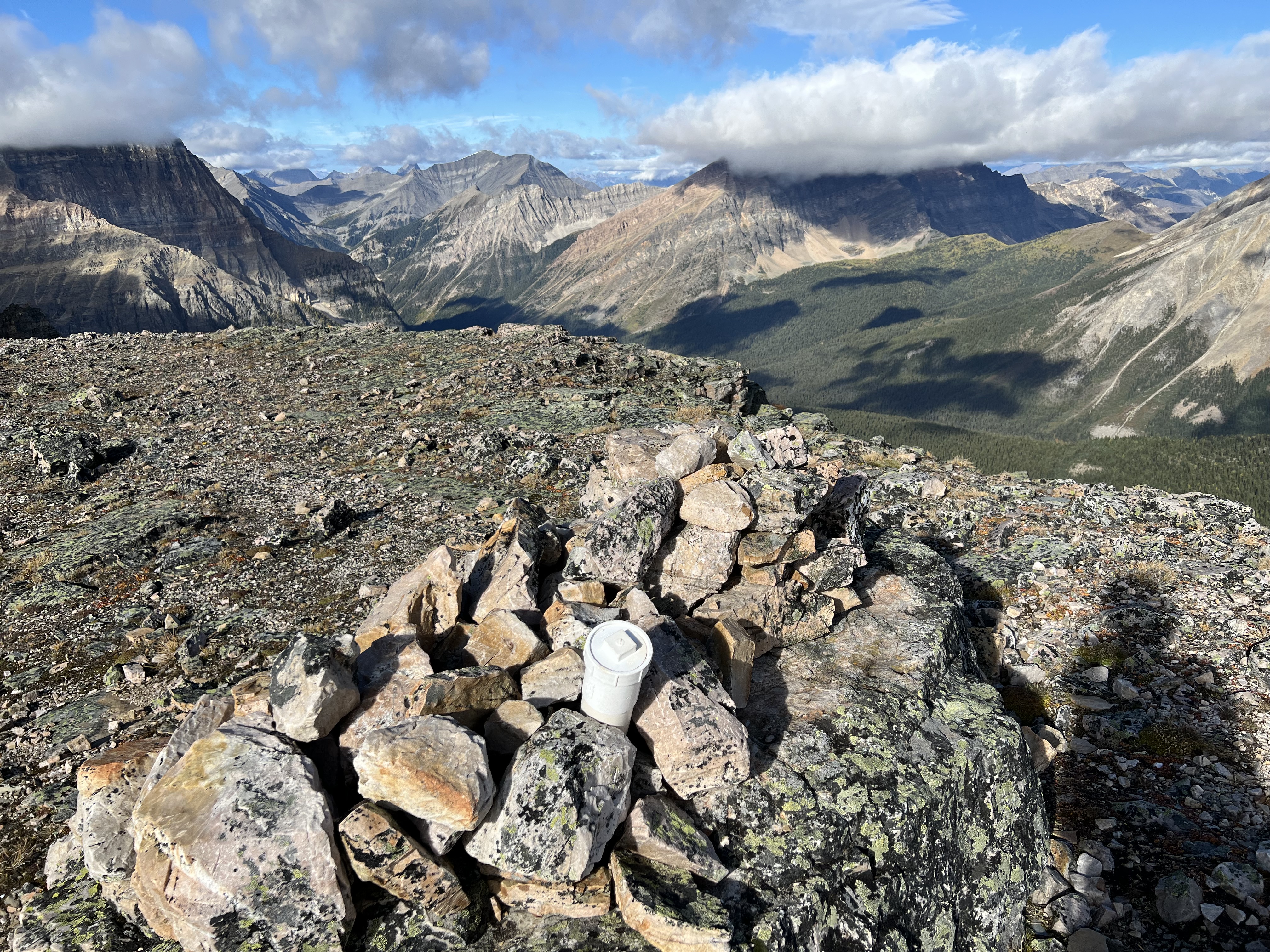 The summit cairn and register on Sunburst Peak