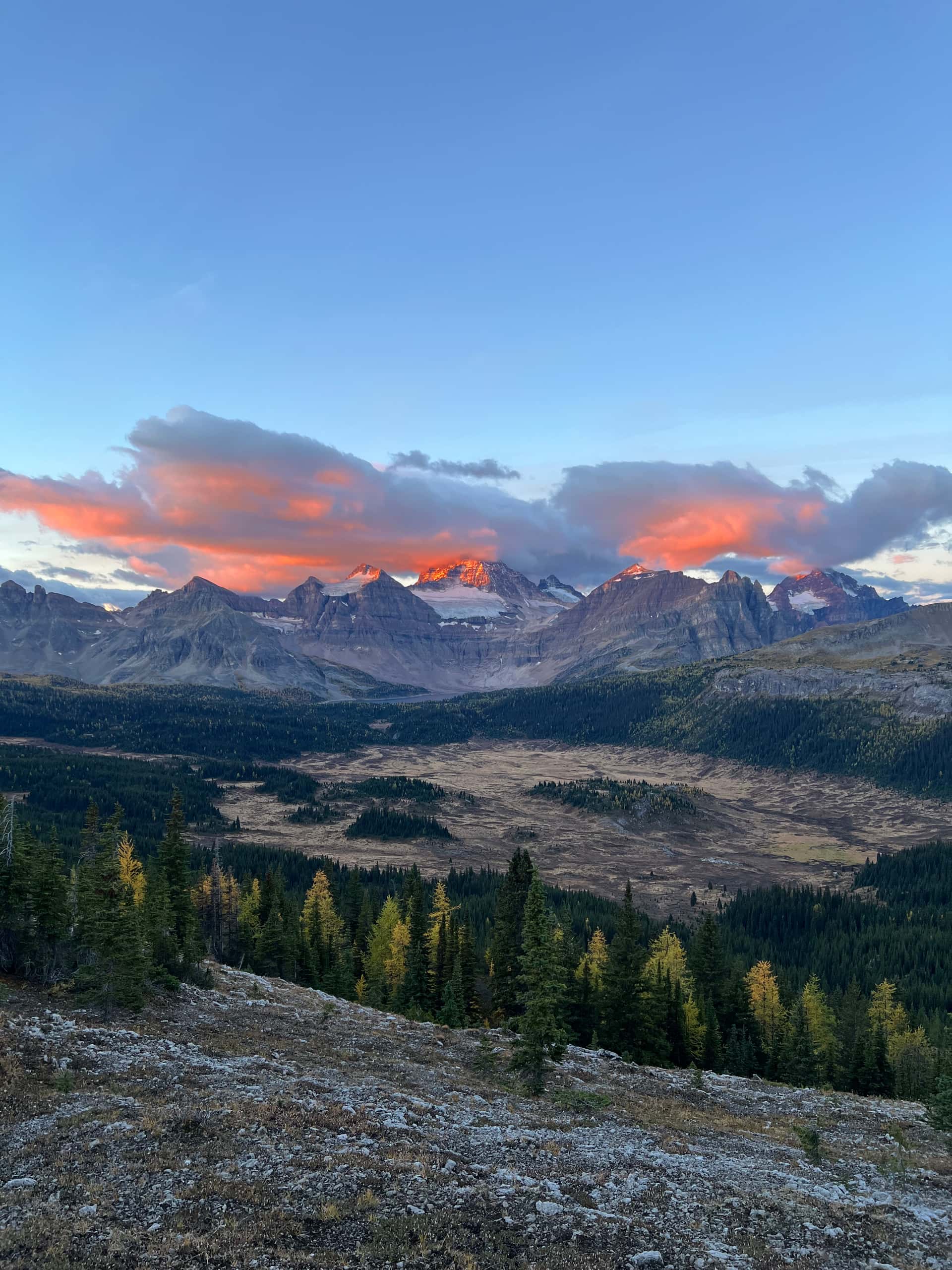 Sunrise on cloudy Mount Assiniboine